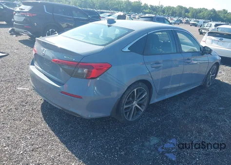 2022 Honda Civic Touring z USA, uszkodzony, nr VIN 2HGFE1F98NH320484